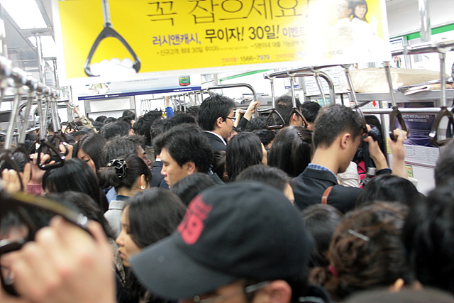crowded people in a train
